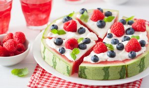 Watermelon "pizza" with fruit and whipped topping